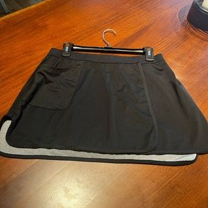 Tail Wrap tennis/golf skirt, 13in the front 14.5 in back.